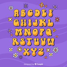 the alphabet with flowers on purple background