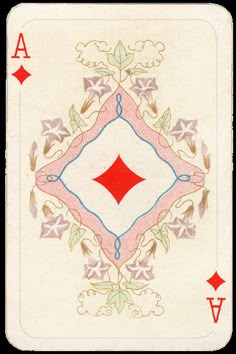 the back side of a playing card with red and blue designs on it's sides