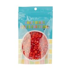 a bag of red berries sitting on top of a counter