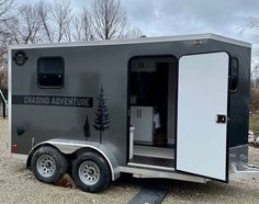 an enclosed trailer with the door open