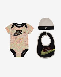 Description This three-piece Nike box set is the perfect gift for a baby shower, birthday, or just because! The set comes complete with a hat, matching booties, and a snap-closure bodysuit for easy dressing and changing. Coming in neutral tones with a super cute, swirled pattern, the soft and gentle three-piece was made for your stylish mini athlete.  Snap closure for easy changing Tag-less for extra comfort Machine Wash Materials: 80% polyester, 20% cotton Size 0-6 Months Nike Box, Easy Dressing, Swirl Pattern, Soft And Gentle, Baby & Toddler Clothing, Three Piece, Neutral Tones, Box Set, Simple Dresses