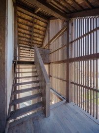 the stairs are made of wood and have wooden slats