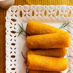 three fried food items on a white plate