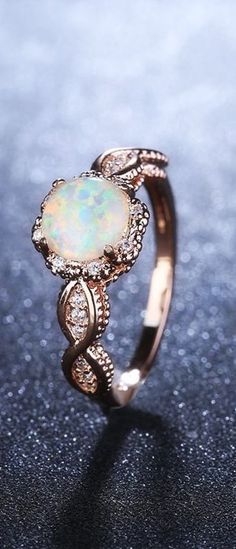 With this beautiful Virant opal rose gold ring, you'll add a true note of class and elegance to each or your oufits. #jewelry #rings #opal Opal Rose Gold Ring, Rose Gold Opal Ring, Ring Rosegold, Engagement Ring White Gold, Sapphire Bracelet, Calla Lily, High Class