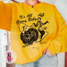 Embrace the spirit of Thanksgiving with our "It's All Gravy Baby Thanksgiving Sweatshirt," a cozy and stylish piece that perfectly captures the joy of the holiday season. Ideal for family gatherings or cozy nights in, this Western-inspired cowgirl turkey sweater is sure to turn heads--grab yours today and celebrate in comfort and style!It's All Gravy Baby Thanksgiving Sweatshirt, Western Thanksgiving Sweatshirt, Cowgirl Turkey Sweater, Matching Thanksgiving PRODUCT DETAILS -100% cotton (Heather Western Thanksgiving, Baby Thanksgiving, Johnny And June, Bff Things, Sweatshirt Western, Thanksgiving Sweatshirt, Thanksgiving Baby, Comfort Colors Sweatshirt, Thanksgiving Shirt