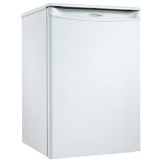 a white refrigerator freezer sitting on top of a white floor next to a wall