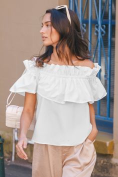 Add a touch of romance with the White Off-Shoulder Flounce Bodice Blouse! It's cute, it's comfy, and it's perfect for summer days or date nights. Product code: CAA04B4D016CC Features:  Woven Off-shoulder styling Short sleeves Flounce bodice Wash Method: Regular Wash Material: 80%POLYESTER,20%COTTON. White Ruffled Off-shoulder Top For Day Out, White Off-shoulder Top With Ruffles For Day Out, Casual Off-shoulder Blouse With Ruffles, Trendy Off-shoulder Short Sleeve Top For Summer, Solid Casual Off-shoulder Top For Spring, Trendy Ruffled Off-shoulder Top For Day Out, Off-shoulder Beach Tops For Summer, White Off-shoulder Summer Top For Vacation, Off-shoulder Summer Beach Tops