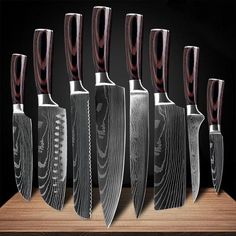 six knives are lined up in a row on a wooden table with the words outlix