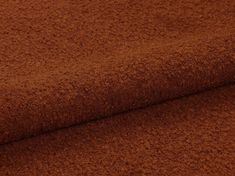 a close up shot of a brown fabric textured with wool and polyestere