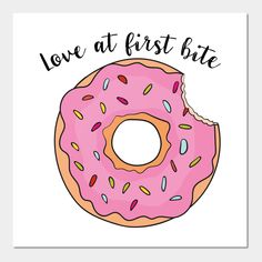 a pink donut with sprinkles and the words love at first bite