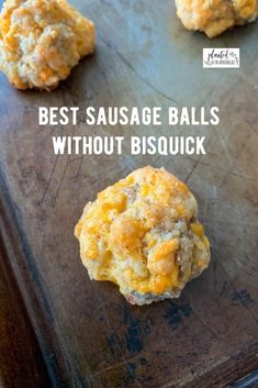 three biscuits sitting on top of a baking sheet with the words best sausage balls without biscuit