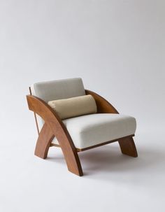 a chair that is made out of wood and fabric