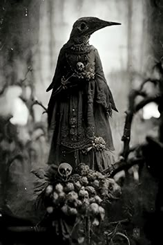 a black and white photo of a woman in a costume with skulls on her head