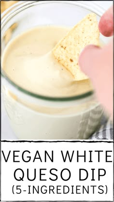 a hand dipping a cracker into a bowl filled with white queso dip ingredients