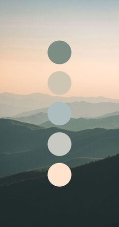 an image of mountains and hills with circles in the middle