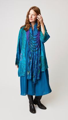 Our knee length, Recycled Silk Kimono is the perfect accessory with traces of life in a faraway place and heritage handiwork. These simple kimonos transform solid basics into special occasion outfits. Lightweight, rich layering color for all seasons and utterly gorgeous wrinkled. Toss these stunning pieces in your luggage for multiple travel options! Shown in Charcoal Blue with the Recycled Silk Shawl. Also available in a shorter hip-length version. A minimum of 75% Silk Hand wash cold - press b Indigo Block Print, Patchwork Vest, Silk Halter Dress, Charcoal Blue, Romper And Jacket, Embroidered Wool, Advanced Style, Silk Shawl, Special Occasion Outfits