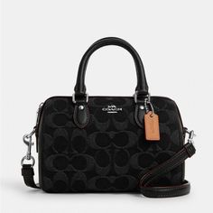 Signature Denim And Smooth Leather Two Credit Card Slots Zip-Top Closure, Fabric Lining Handles With 2 3/4" Drop Detachable Strap With 23 1/2" Drop For Shoulder Or Crossbody Wear 7" (L) X 4 3/4" (H) X 4" (W) Style No. Co963 Coach Handbags Mini, Black Bags With Branded Hardware For Fall, Fall Black Bags With Branded Hardware, Coach Mini Rowan, Brown Coach Purse, Mini Hand Bag, My Style Bags, Drawstring Bucket Bag, Girly Bags