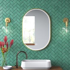 a bathroom with a sink, mirror and light bulbs on the wall next to it