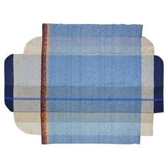 two pieces of blue and beige plaid fabric