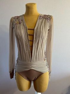 a mannequin is dressed up in an open - front cardigan and panties