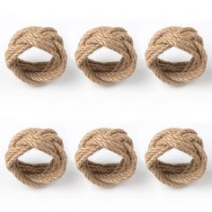 four pieces of rope tied together on white background