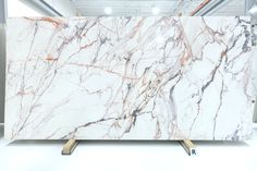 a large white marble slab in a warehouse