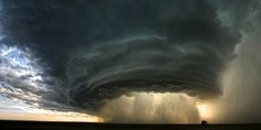 a large cloud is seen in the sky