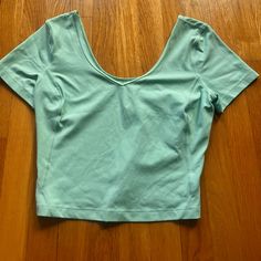 First Pictures Are Hard To See The Color. Sea Foam Green Color. Brand New Condition, Size 6. Will Negotiate Price Blue V-neck Athleisure Top, Spring Workout Tops With Short Sleeves, Spring Workout Short Sleeve Tops, Green Scoop Neck Sports Top, Green Scoop Neck Athleisure Top, Green Scoop Neck Top Athleisure Style, Blue Yoga Crop Top, Blue V-neck Yoga Top, Blue V-neck Top For Yoga