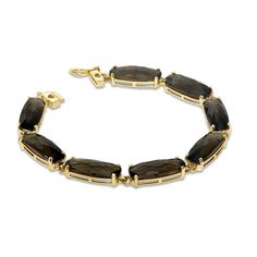 Raise the style bar with this sleek and stunning fashion bracelet! Crafted in 10K gold, each link is set with an elegant 18.0 x 7.0mm bar-shaped cushion-cut smoky quartz. Eight shimmering quartz are used to create this captivating style. Polished to a brilliant luster, this 7.0-inch bracelet secures with a tongue and groove clasp. Halo Engagement Ring Wedding Band, Engagement Rings Vintage Halo, Gold Cushions, Gold Diamond Wedding Band, Diamond Engagement Rings Vintage, Rose Gold Wedding Bands, Tongue And Groove, Rose Gold Engagement, Smokey Quartz