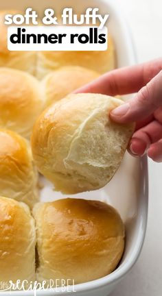 a person dipping some bread into a white dish with the words soft and fluffy dinner rolls