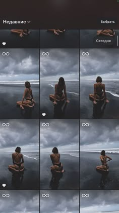 a woman sitting on top of a beach next to the ocean in front of clouds