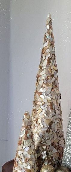 there is a christmas tree made out of rocks