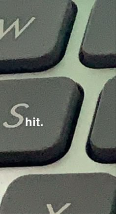 a computer keyboard with the word shut on it's key and an arrow pointing up