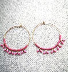 gilded brass creole earrings, embellished with fine Japanese Miyuki rose glass beads, and rose enameled spikes. Diameter of the Creole: 3 cm Nickel free warranty. Jewel delivered in gift pouch. Sending neat by mail tracking Pink Hoop Earrings With Tiny Beads As Gift, Pink Hoop Earrings With Tiny Beads For Gift, Pink Hoop Metal Jewelry, Pink Tiny Beads Hoop Earrings, Pink Hoop Beaded Earrings With Tiny Beads, Pink Beaded Small Hoop Jewelry, Pink Small Hoop Jewelry With Tiny Beads, Pink Small Hoop Beaded Earrings As Gift, Small Pink Hoop Earrings Nickel Free