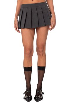 Preppy pleats put a polished spin on a sassy skort cut in a mini-length silhouette. Hidden side-zip closure 45% polyester, 45% rayon, 10% spandex Machine wash, dry flat Imported Gray Pleated Skort, Grey Pleated Short Skort, Gray Pleated Skort Of Short Length, Gray Pleated Short Length Skort, Gray Pleated Mini Skort, Gray Fitted Mini Tennis Skirt, Gray Fitted Mini Pleated Skirt, Fitted Gray Mini Pleated Skirt, Gray Fitted Pleated Mini Skirt