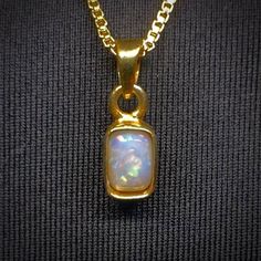 Elevate Your Jewelry Collection With This Exquisite Handmade Rectangle Opal Necklace From The Opal Source. The Pendant Features A Beautiful White Opal Set In A Flawless Yellow Gold Filled Bezel. Type - White Location - Coober Pedy Weight - 0.60 Cts Size - 6mm X 4mm X 3mm Pattern - Floral Shape - Rectangle Metal - 18k Gold Filled Chain - 18” 1mm Box Chain View A Full Video Of This Beautiful Necklace - Https://Www.Theopalsource.Com/Product-Page/Colorpainted-Australian-Coober-Pedy-Handmade-Rectangle-Opal-Necklace-18k-Gold Coober Pedy, Mens Accessories Jewelry, Accessories Jewelry Necklace, Beautiful Necklace, Opal Necklace, White Opal, Gold Filled Chain, Pattern Floral, Box Chain