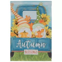 an autumn card with sunflowers and gnomes in the back of a truck