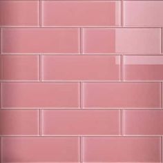 a pink brick wall that is very close to the ground