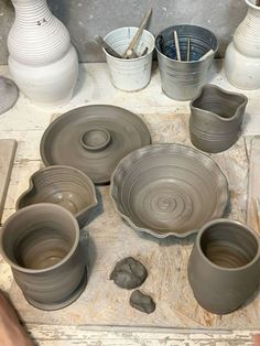 the pottery is being made on the table