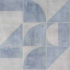 an abstract blue and white tile design