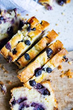 slices of blueberry bread on a cutting board