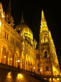 an ornate building lit up at night