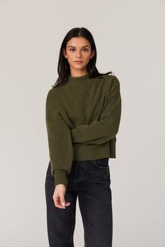 Elevate your winter wardrobe with our Vhari Mock Neck Sweater. Crafted from a cozy wool blend, this cropped sweater boasts a sophisticated mock neck that adds an air of elegance to any outfit. Stay warm and stylish all season long. Sweater Fabric: soft, knit, olive night, green Long sleeves Mockneck Ribbed cuff, hem and neck 63% Recycled Polyester 25% Nylon 7% Wool 5% Elastane Our model is 5ft10" and wearing a Size S Olive Green Sweater Outfit, Blue Wine Glasses, Fall Green, Sweater Fabric, Long Sweater, Capri Blue, Mock Neck Sweater, American Express, Fall Sweaters