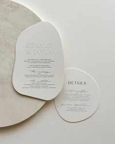 the wedding stationery is laid out on top of each other, and it looks like they were made from paper