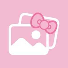 a hello kitty wallpaper with the image of a camera and its pink bow on it