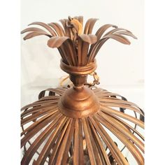 a wooden lamp with metal accents on it