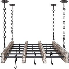 a wooden bench sitting on top of a metal frame suspended by chains with lights above it