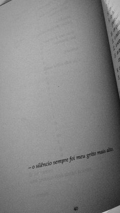 an open book with some type of text on the page in black and white photo