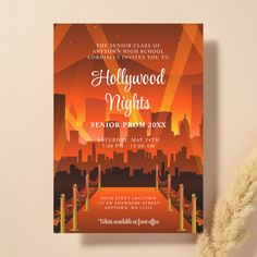 an orange and red poster with the words hollywood nights on it next to a plant