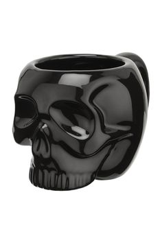 a black skull shaped vase on a white background